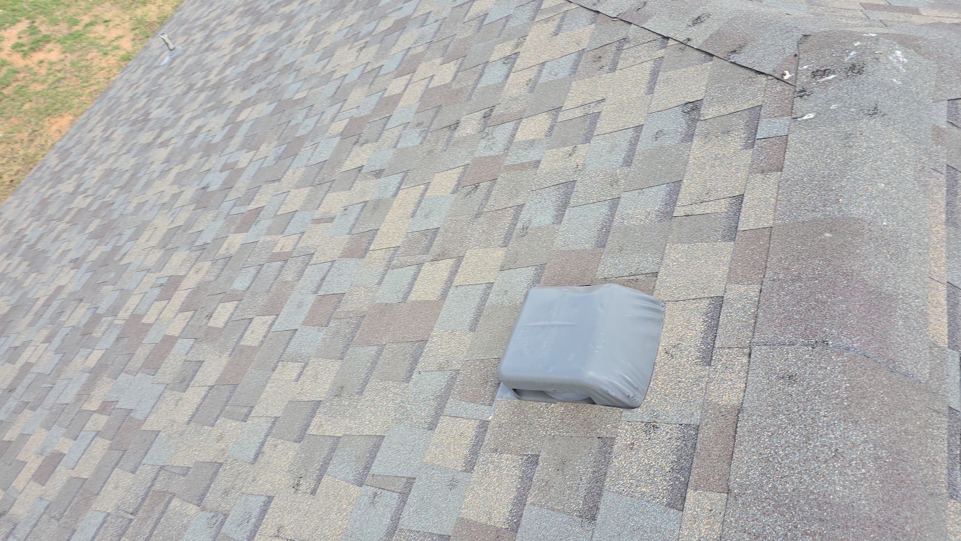 Midland commercial roof before storm wind damage repair - Blown off shingles - 5 Star Commercial Roofing